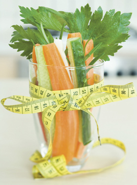 Vegetables with measuring tape-diets on test-diet tips-weight loss-woman and home