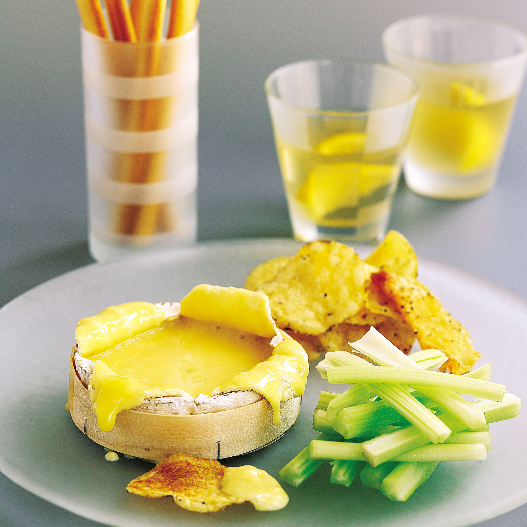 Melted Camembert with celery sticks, grissini and posh crisps recipe Melted Camembert with celery sticks, grissini and posh crisps recipe