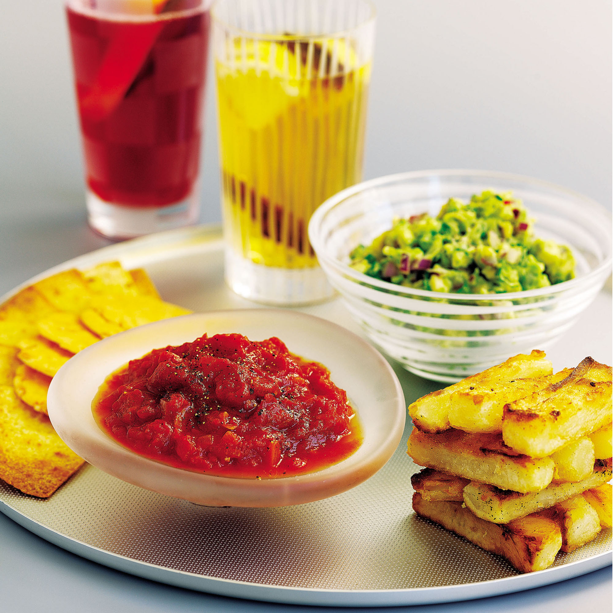 Guacamole with Cheddar sablés and home-made tortilla chips recipe Guacamole with Cheddar sablés and home-made tortilla chips recipe