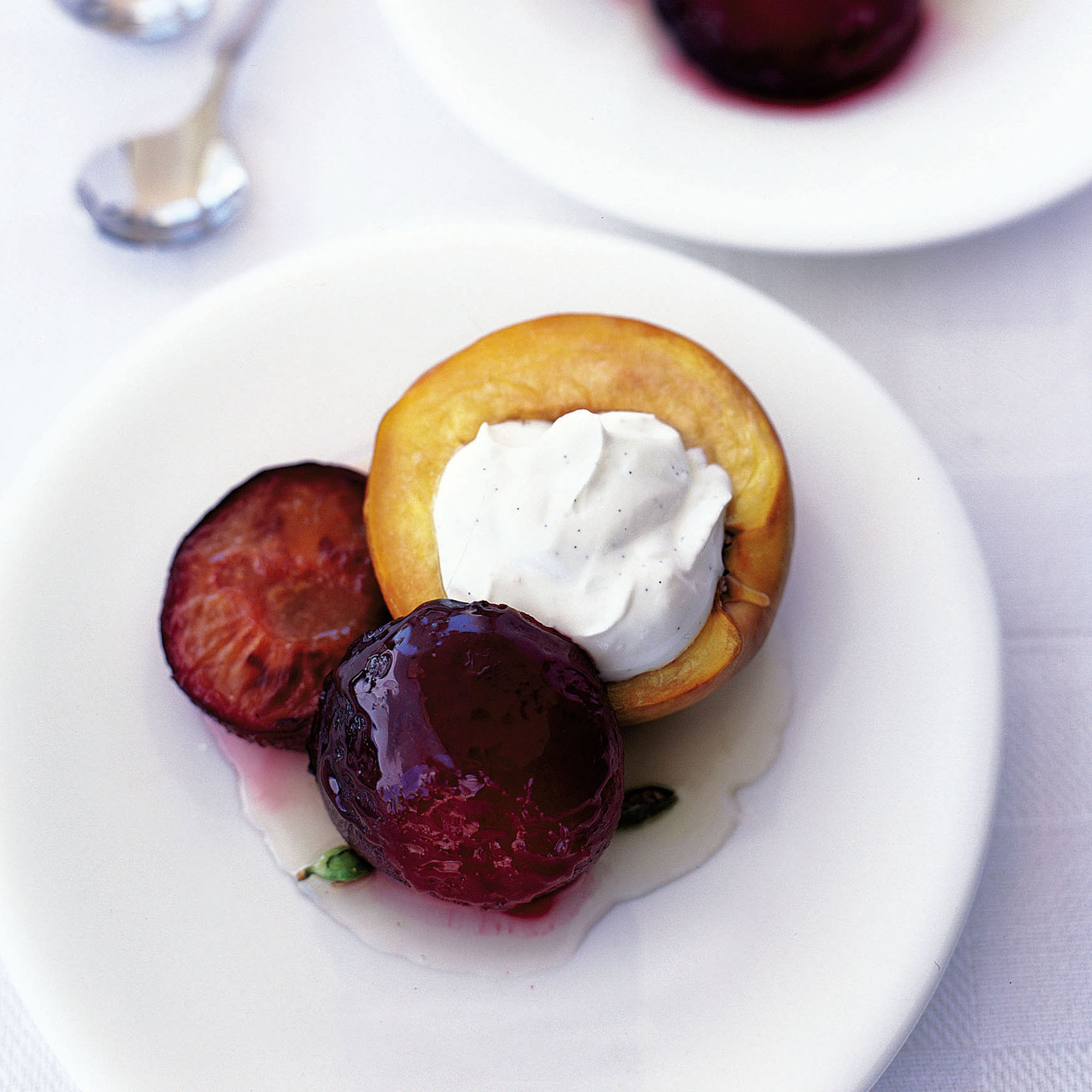 Roasted stone fruits with cardamom and honey and vanilla cream recipe Roasted stone fruits with cardamom and honey and vanilla cream recipe