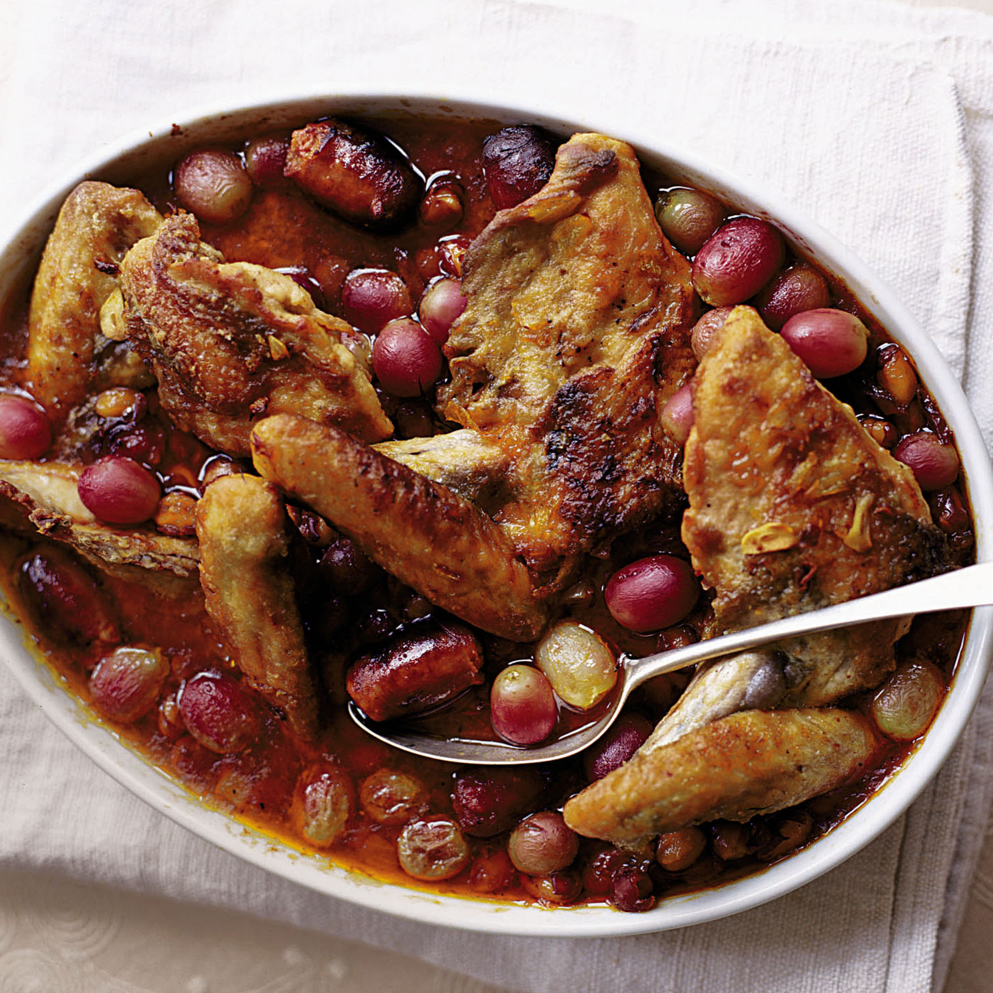Braised guinea-fowl with manzanilla, grapes and chorizo recipe Braised guinea-fowl with manzanilla, grapes and chorizo recipe