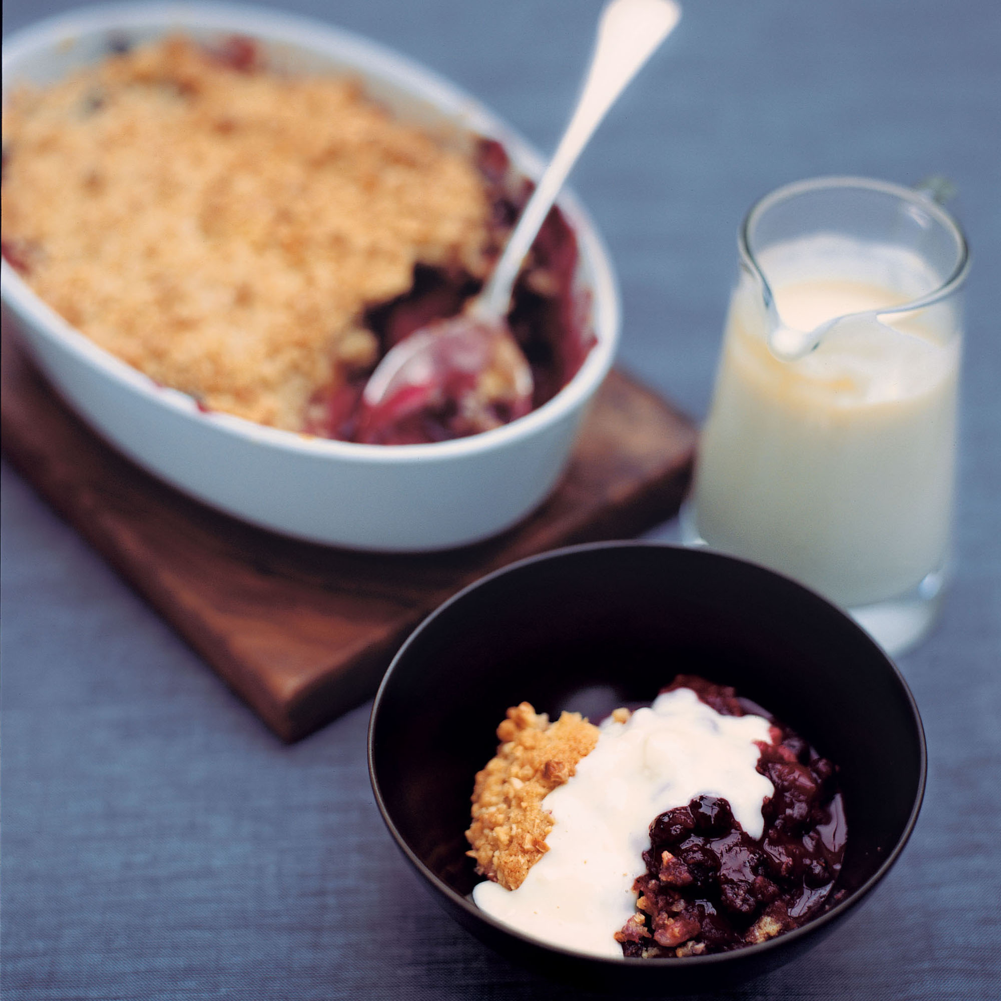 Apple and dark fruit crumble with vanilla custard recipe Apple and dark fruit crumble with vanilla custard recipe