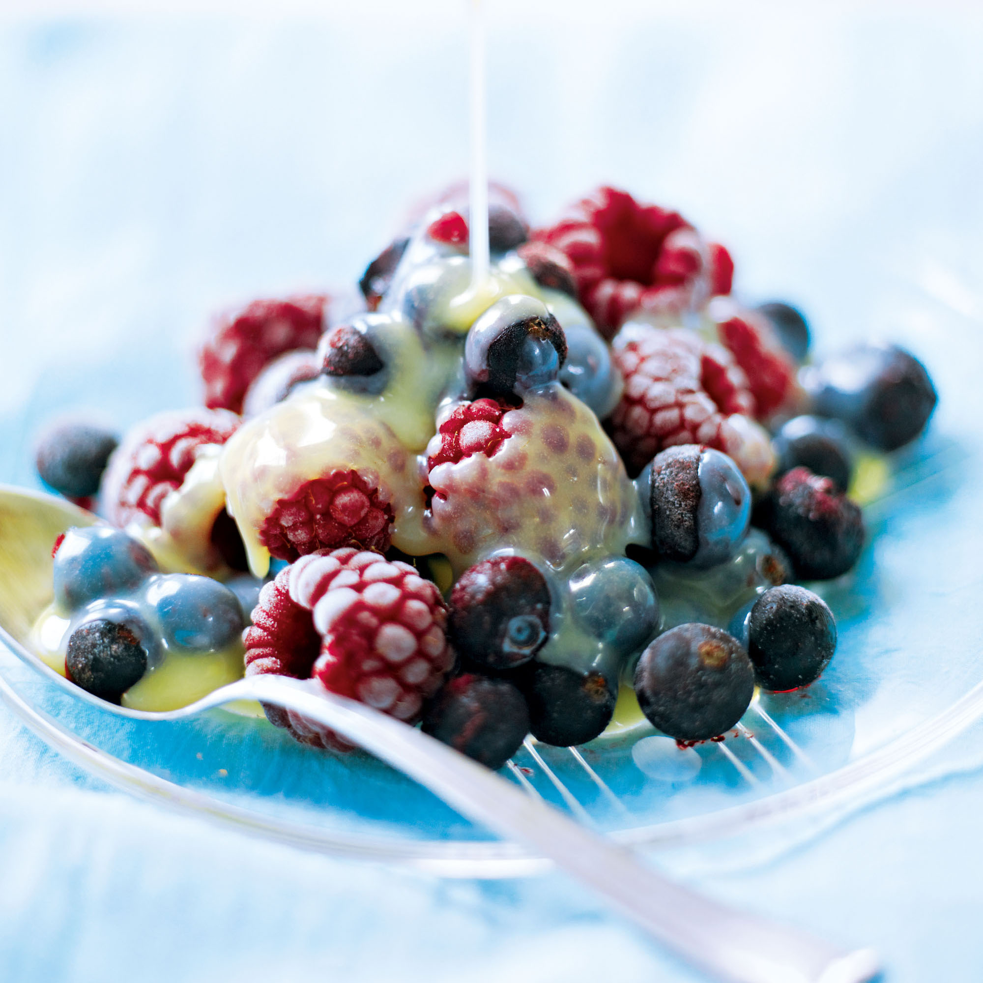Iced berries with a hot white chocolate sauce recipe
