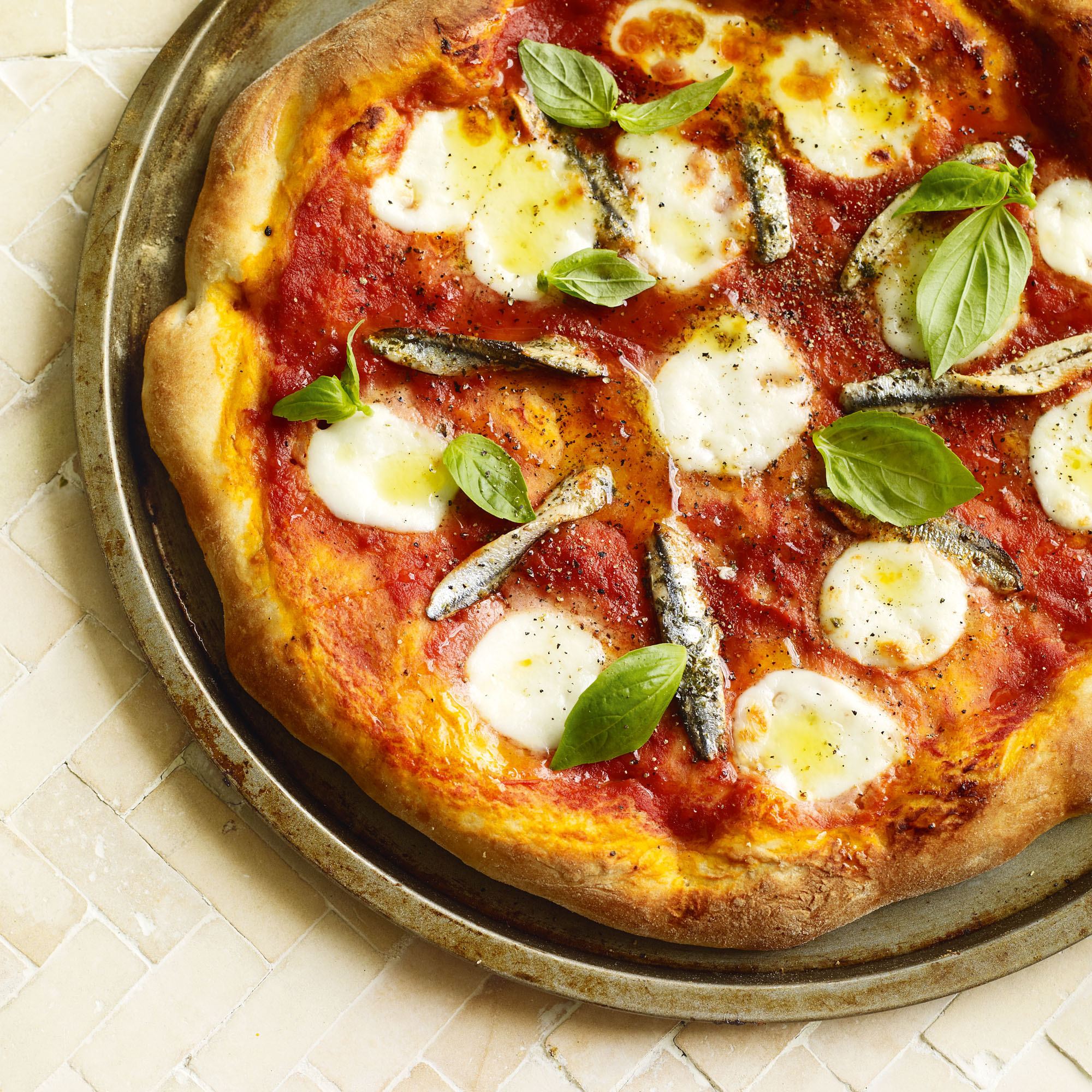 Tomato, mozzarella and anchovy pizza Tomato, mozzarella and anchovy pizza