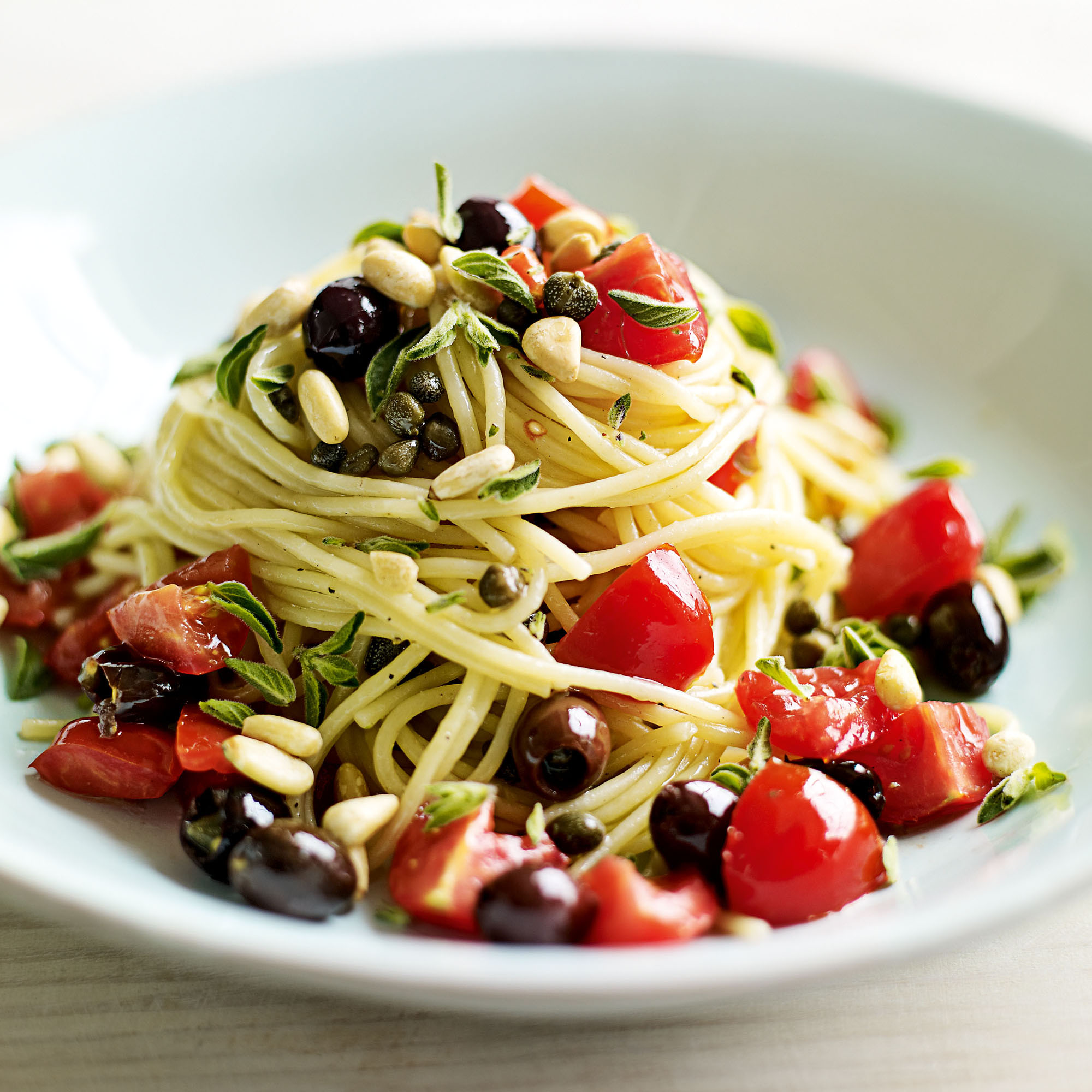 Tomato, black olive and caper spaghetti recipe