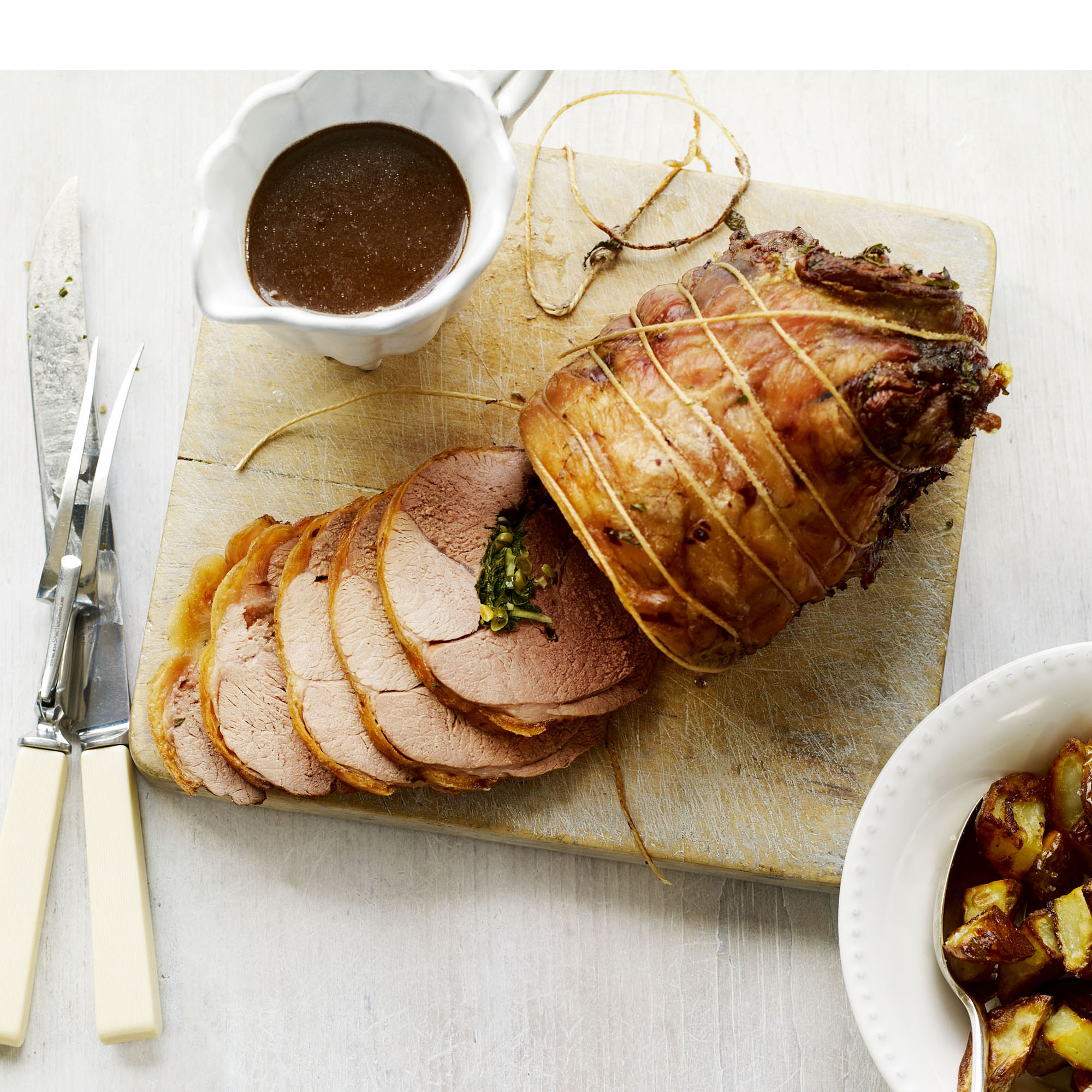 Boned leg of spring lamb with herb and pine nut stuffing recipe Boned leg of spring lamb with herb and pine nut stuffing recipe