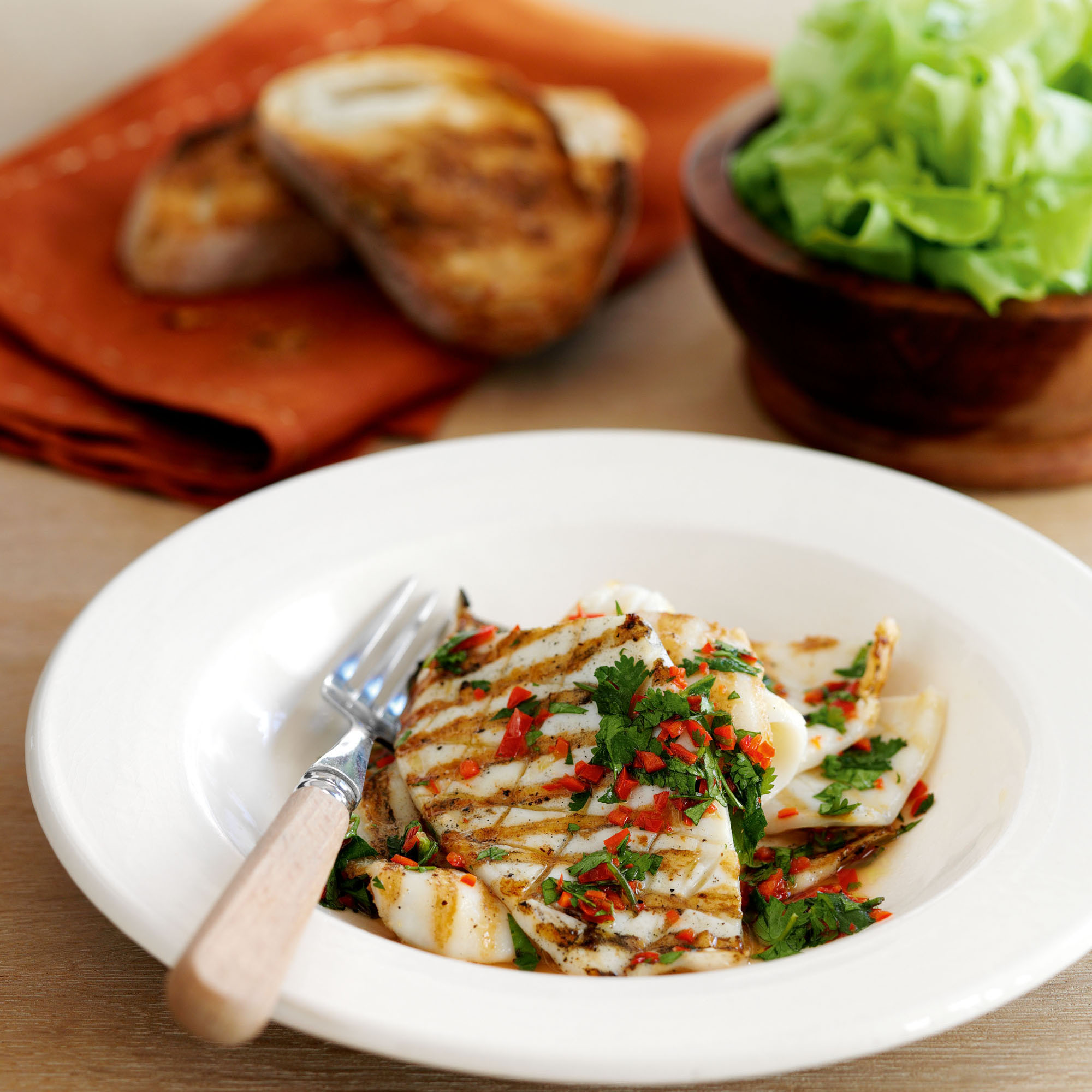 Squid with chilli, lime and coriander dressing recipe Squid with chilli, lime and coriander dressing recipe