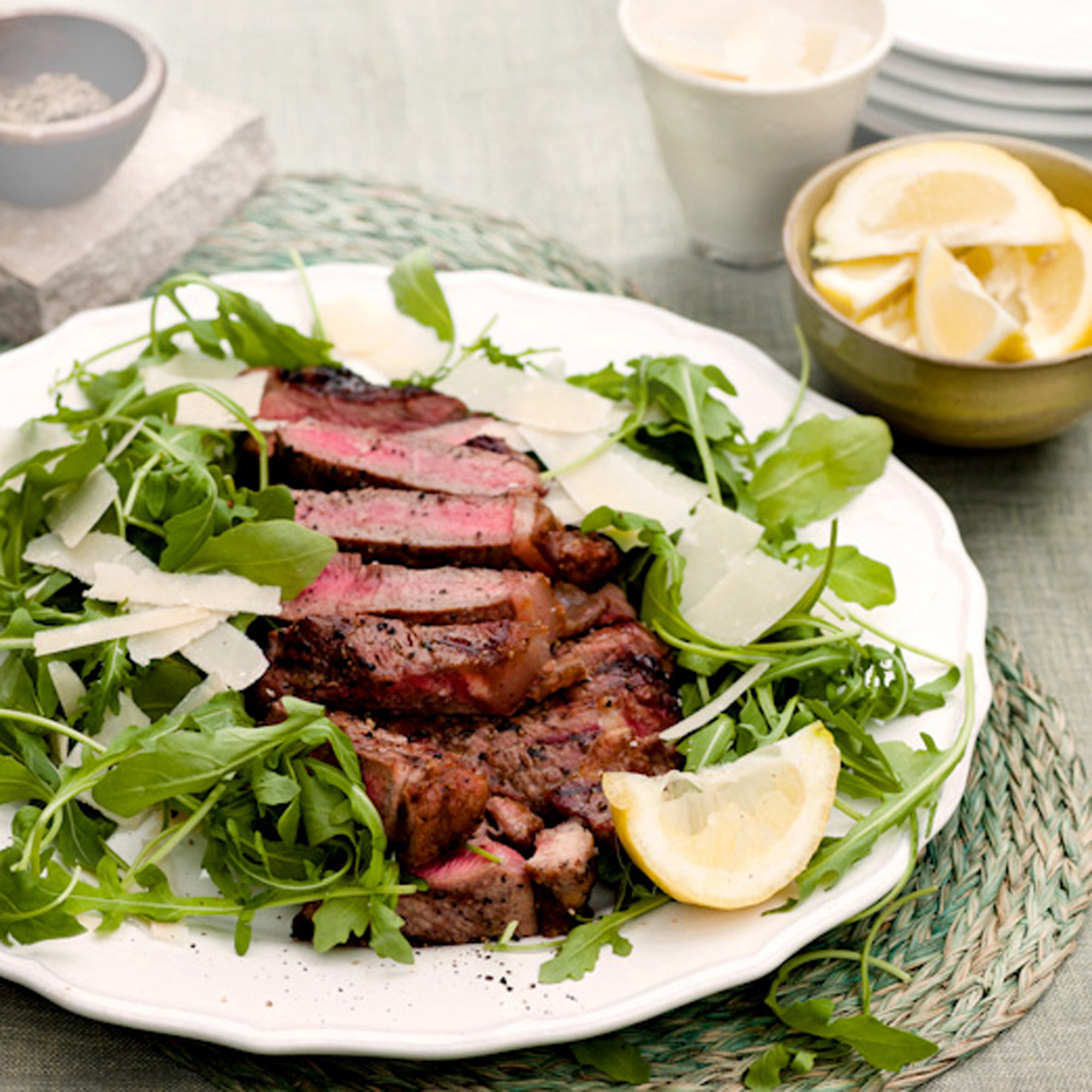 Chargrilled sirloin with rocket, Parmesan and lemon recipe Chargrilled sirloin with rocket, Parmesan and lemon recipe