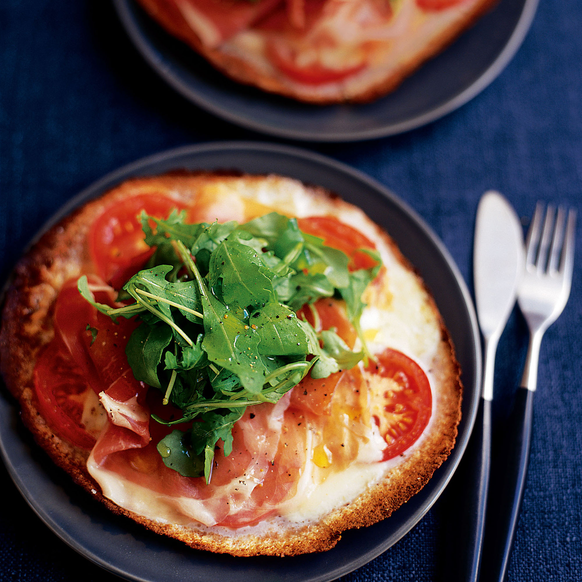 Mozzarella, Parma ham and rocket pizza recipe Mozzarella, Parma ham and rocket pizza recipe