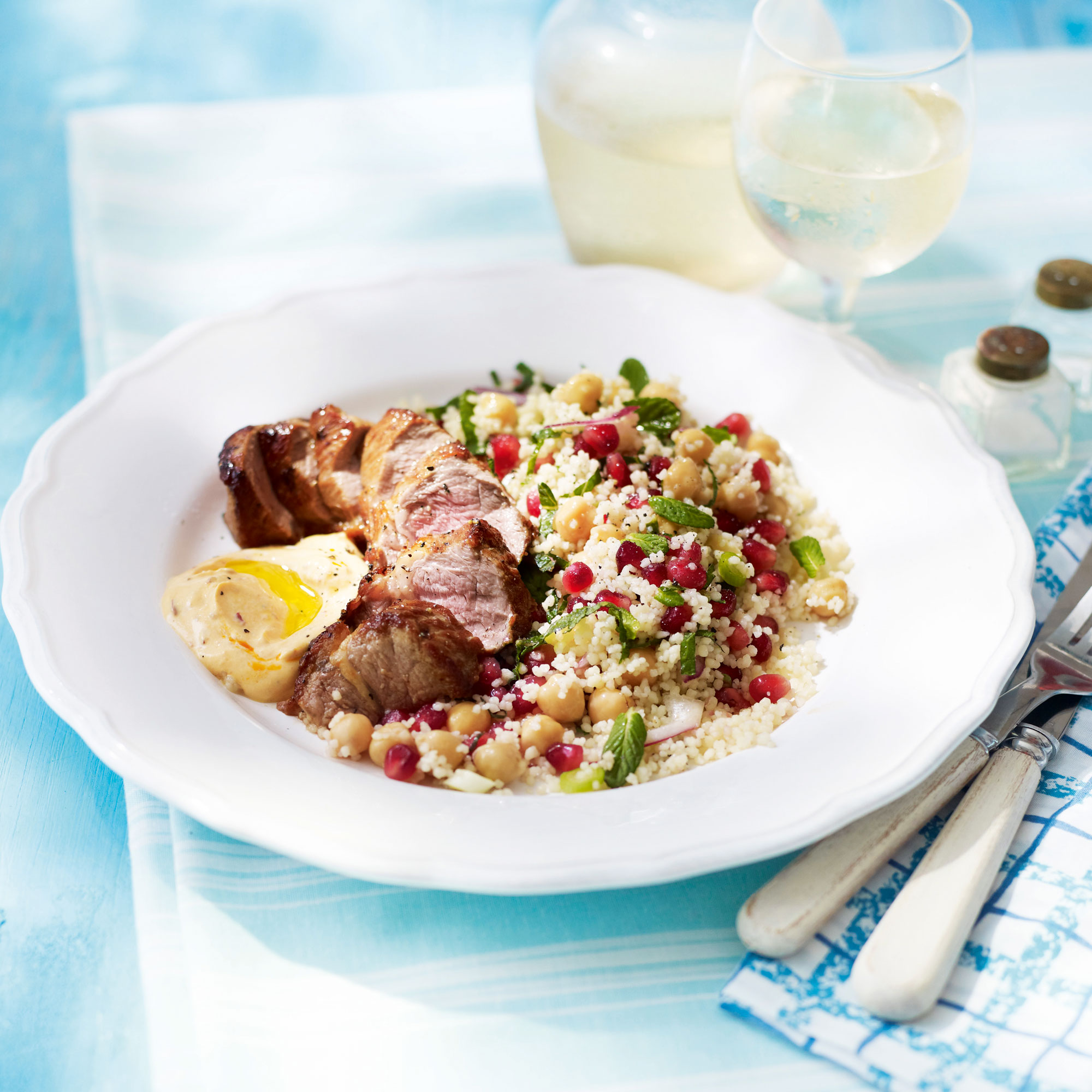 Lamb fillet with chickpea and pomegranate couscous, and harissa dressing recipe Lamb fillet with chickpea and pomegranate couscous, and harissa dressing recipe