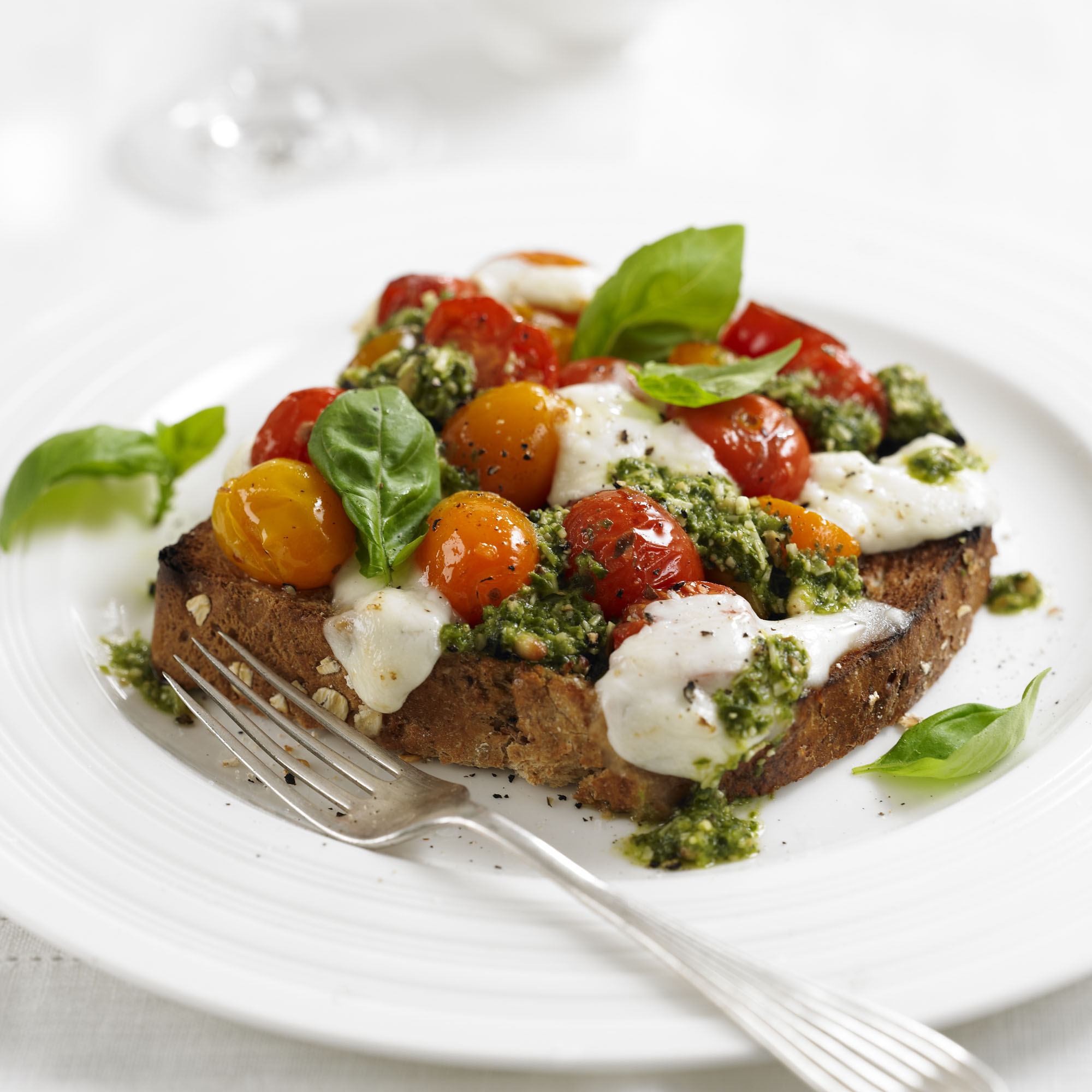 Roast tomato & mozzarella sandwich with basil and pesto recipe Roast tomato & mozzarella sandwich with basil and pesto recipe