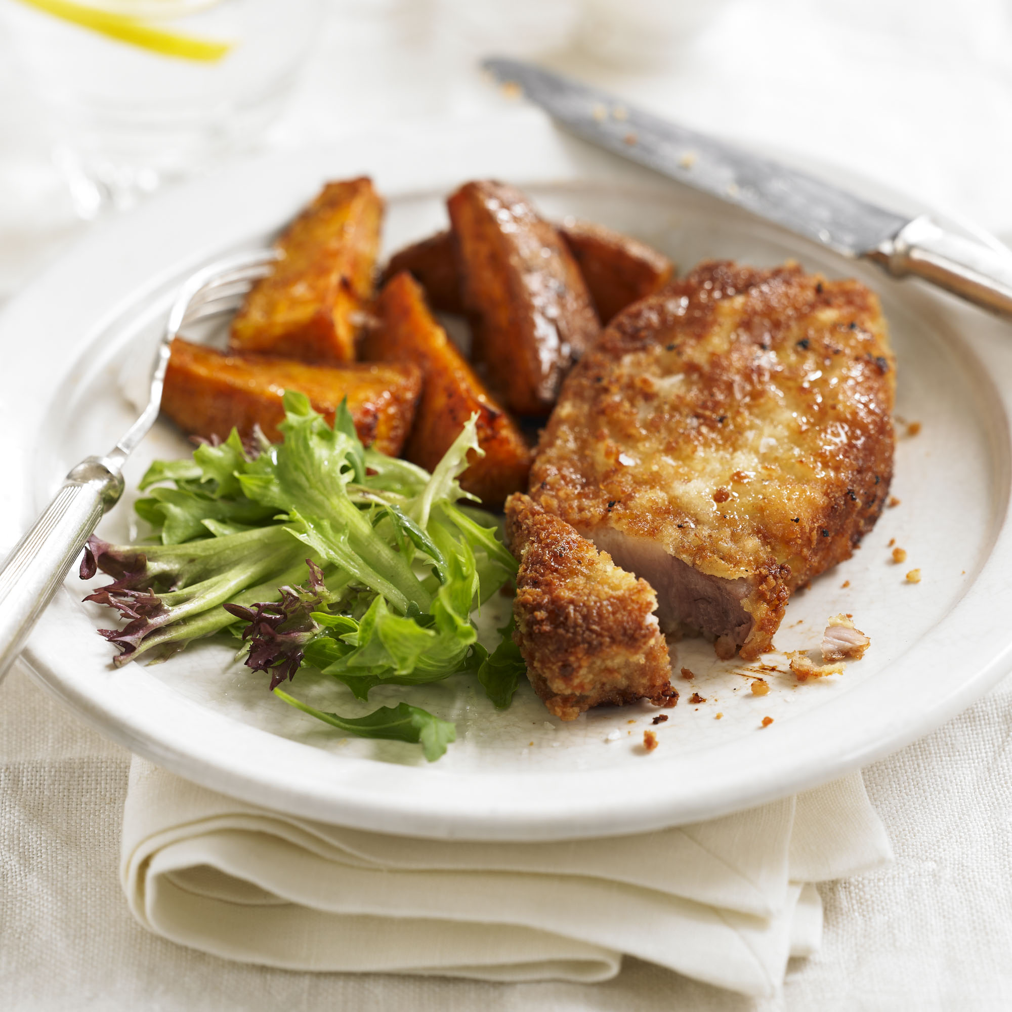 Parmesan pork with paprika sweet potato wedges recipe Parmesan pork with paprika sweet potato wedges recipe