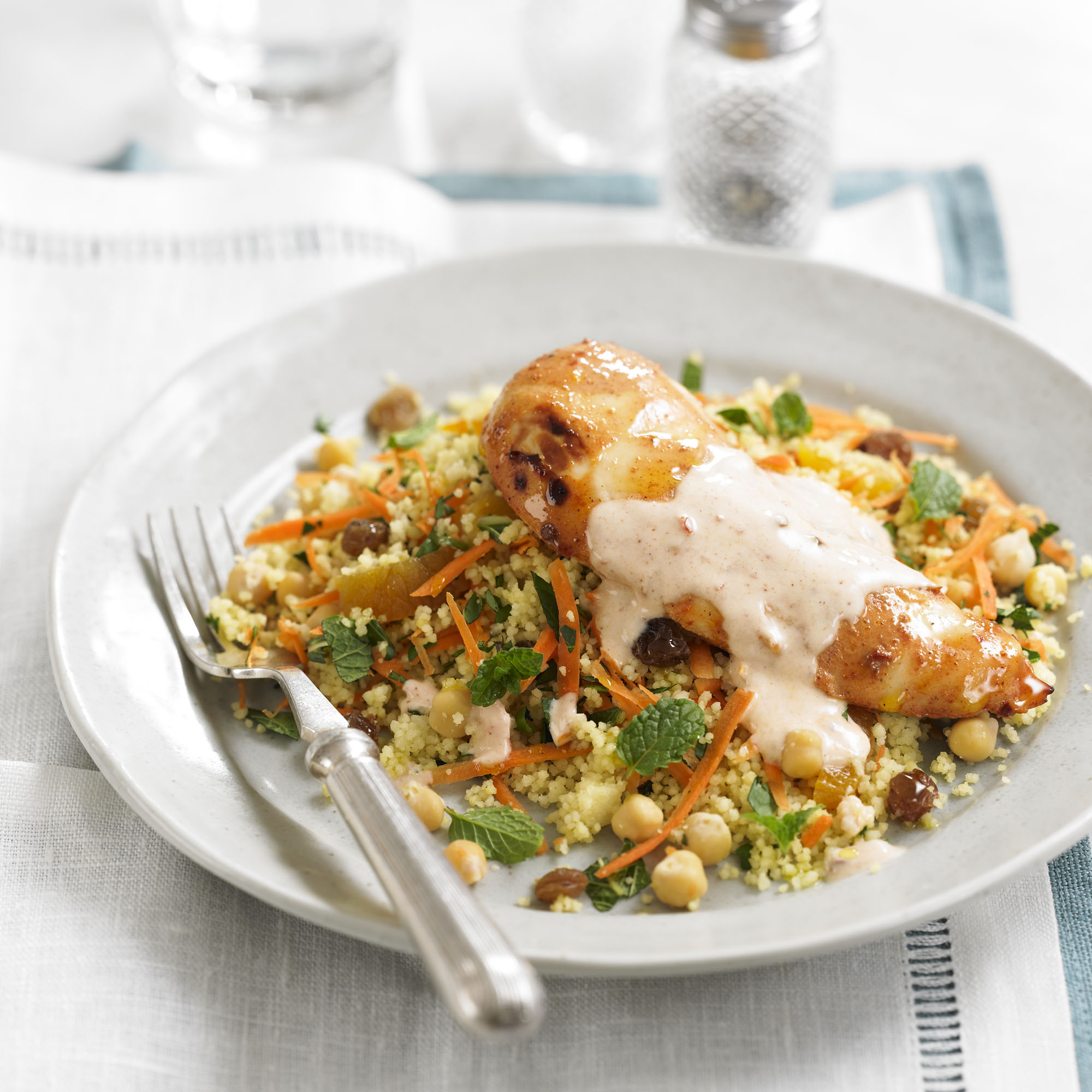 Spiced chicken with fruity couscous & yogurt dressing recipe Spiced chicken with fruity couscous & yogurt dressing recipe