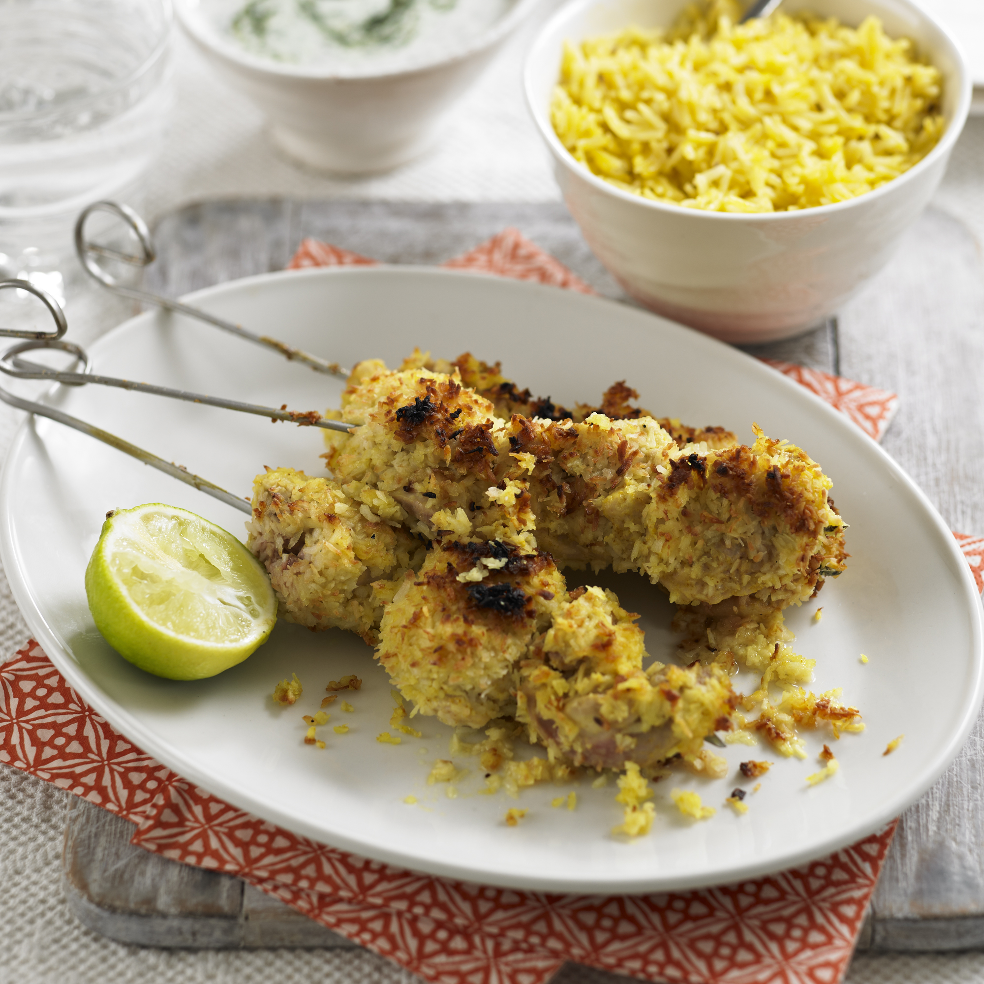 Coconut coated chicken kebabs with raitha recipe Coconut coated chicken kebabs with raitha recipe