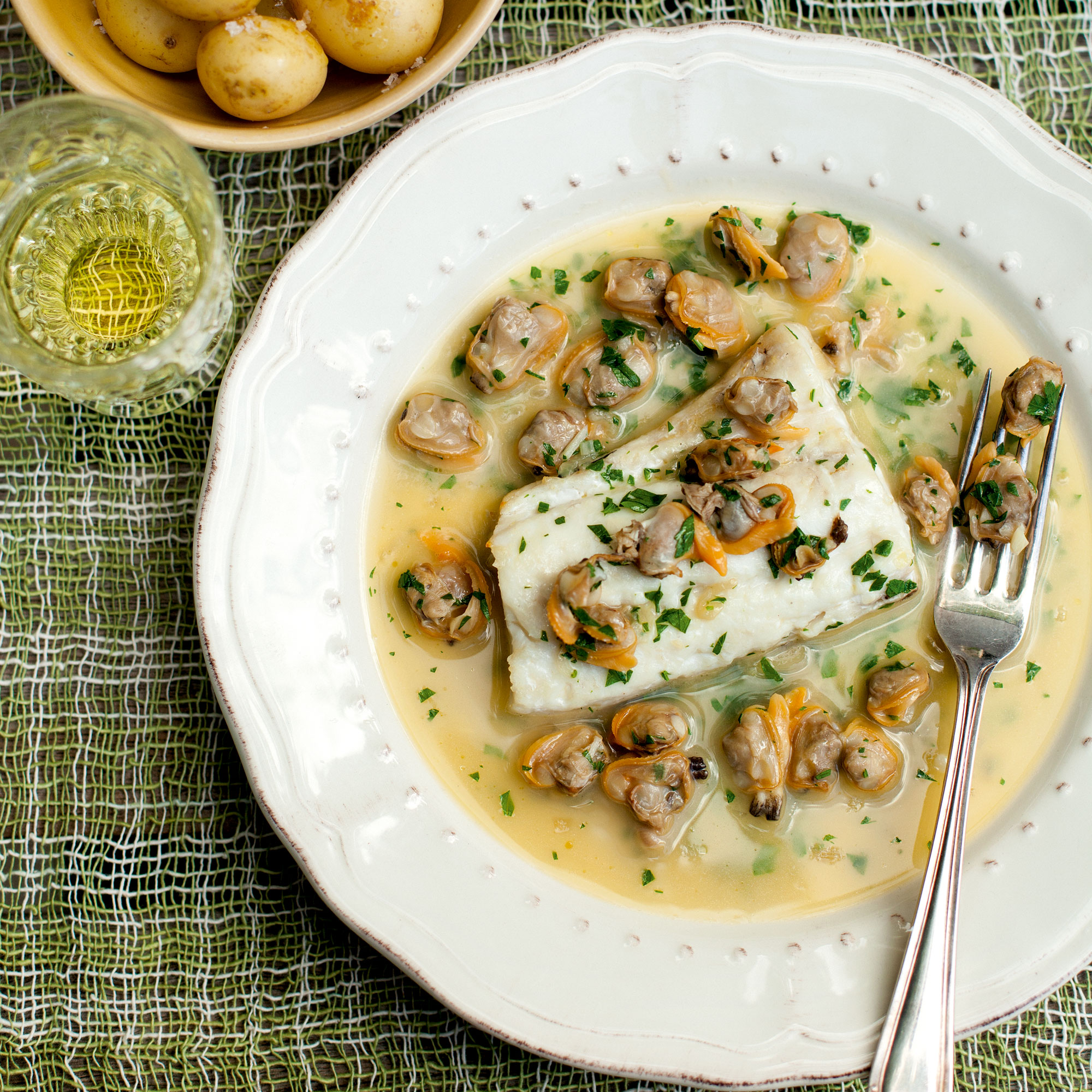 Roasted hake with buttery clam sauce Roasted hake with buttery clam sauce