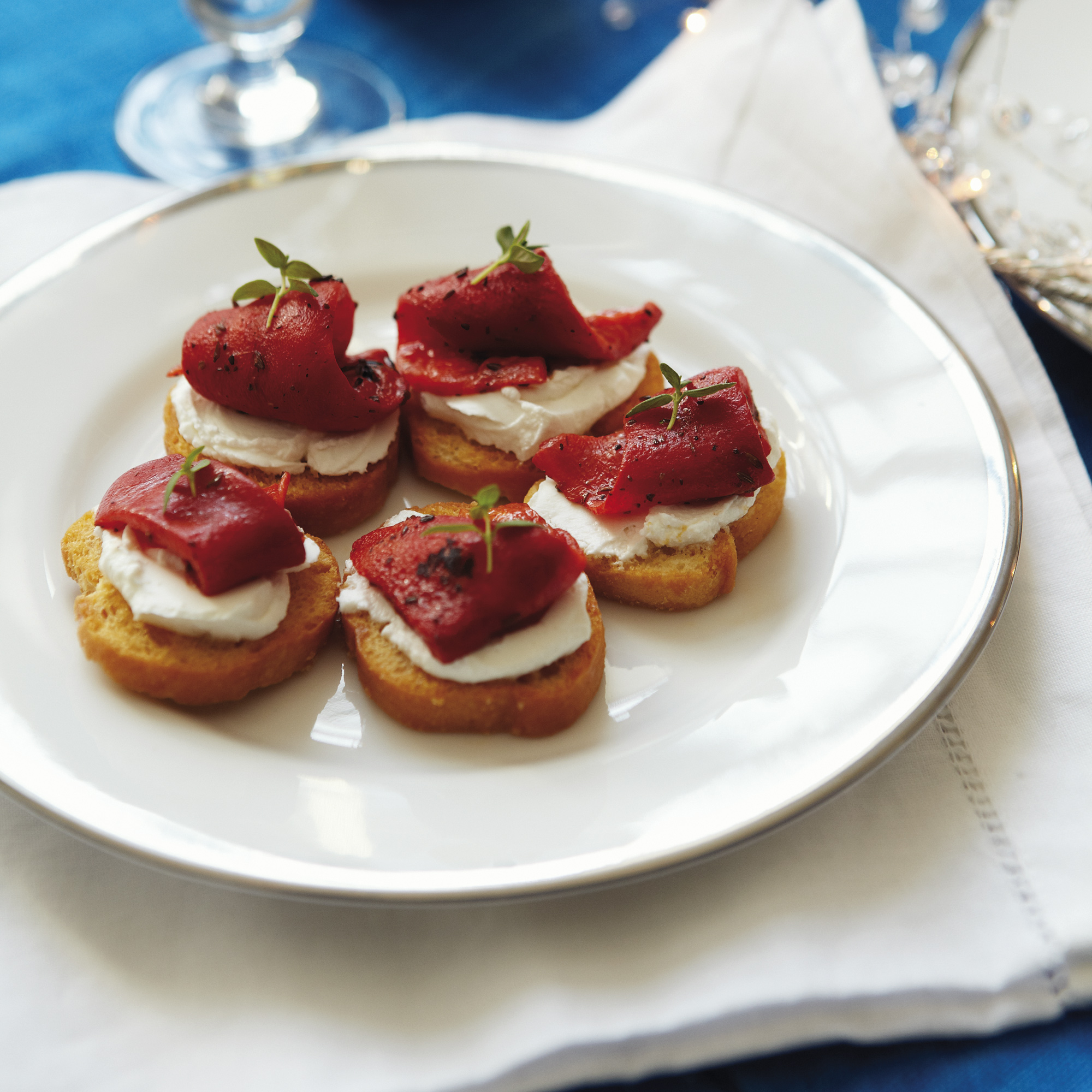 Crostini of roasted red peppers with goats' cheese