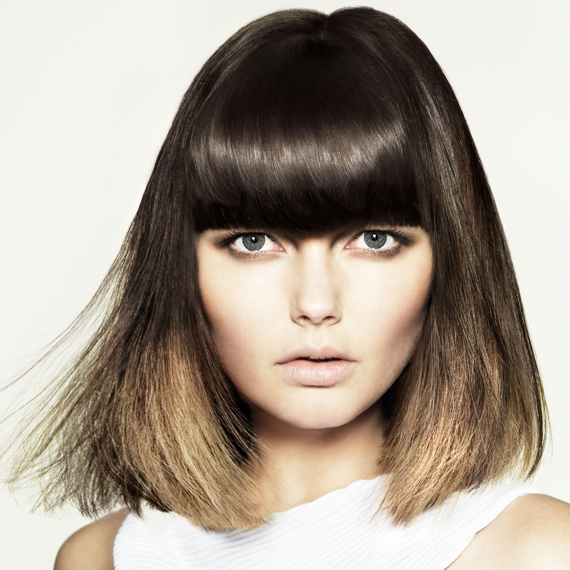 Photo of a model with a long bob with fringe hairstyle