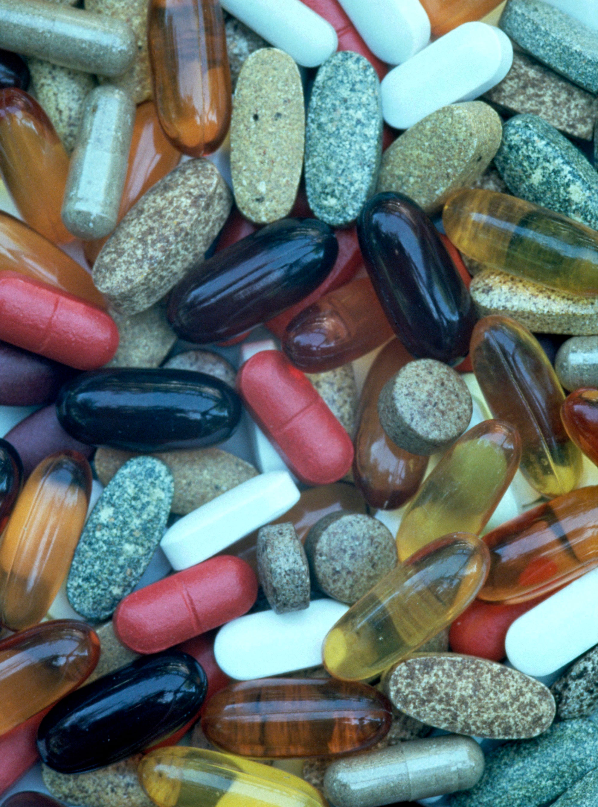 They pop a quality fish oil supplement Photo of various vitamin pills