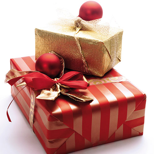Still searching for the perfect gift for that glamorous woman on your list? From a stylish new clutch bag to 2013's must-have coffee-table book, these purse-friendly treats are undeniably chic...