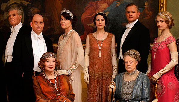 Whatever the weather on Christmas Day, the sun will be shining in Downton! The first Christmas special pics have just been released showing the Crawleys enjoying summer in London. But there's a serious scandal looming. SEE behind-the-scenes photos now...